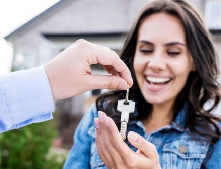 house buyer getting keys to new home